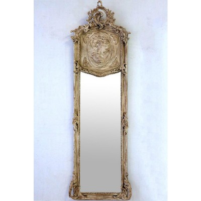 ٍٍA distinctive French Rocaille Louis XV style Pillar Mirror, hand carved and applied with aged blanc de plomb finishing, scratches and patina, The serpentine top ornamented with rocaille motifs of acanthus volute scrolls and shell carvings with volutes and blossoming works personifying live decorations of Rococo omnipresence above a central oval inset with female figure and surrounded with four corner cartouches and terminating with mixed curves acanthus panelings, The concave frame below with a beveled mirror plate and ornate with rocaille mixed curve ornaments terminating with C scrolled acanthus volutes on a shell